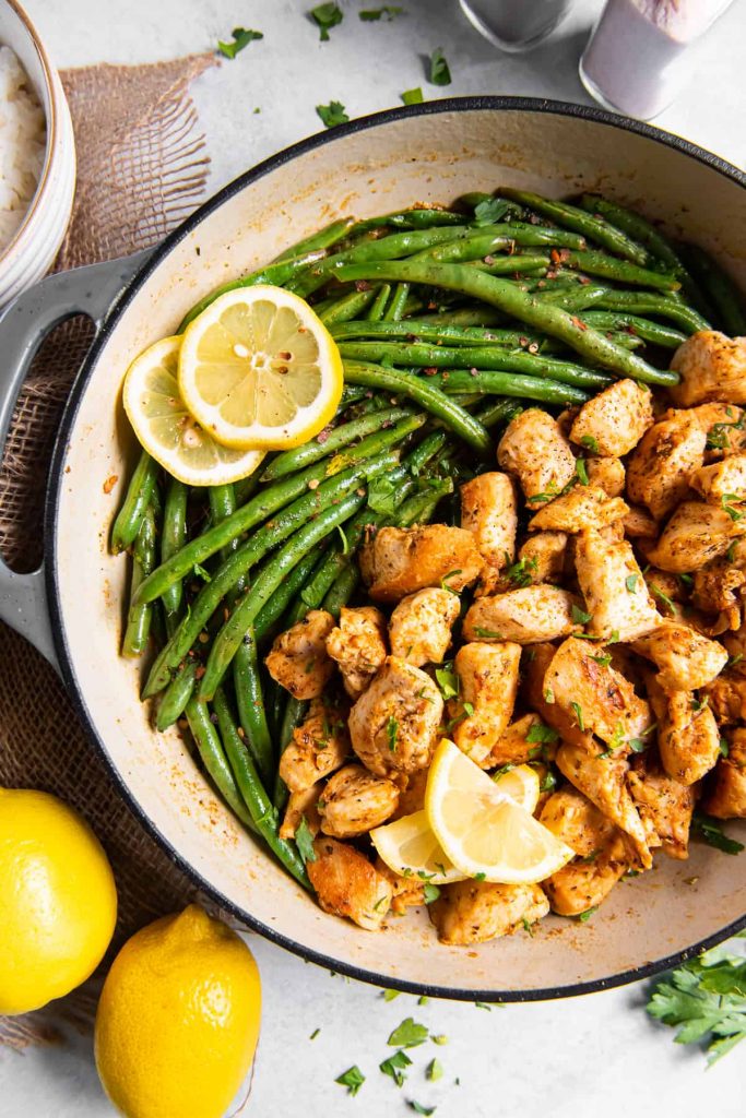 Chicken Green Bean Skillet in a large cast iron skillet with white coating
