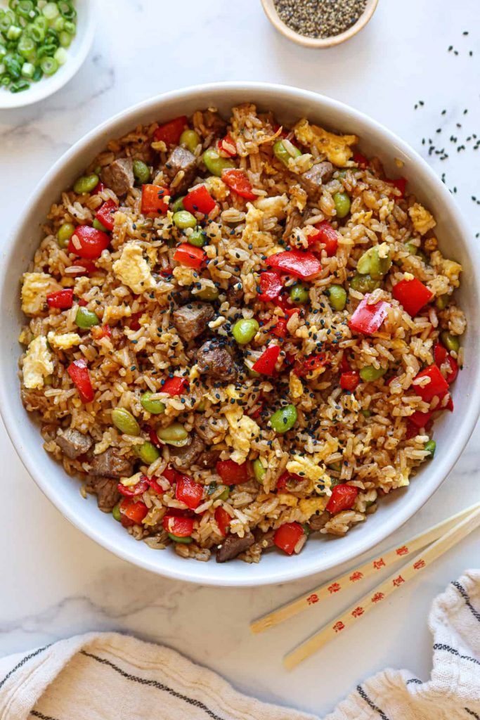 overhead shot of Steak Fried Rice in a large white bowl