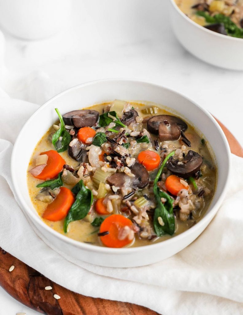 a bowl of Vegan Wild Mushroom Soup in a white bowl