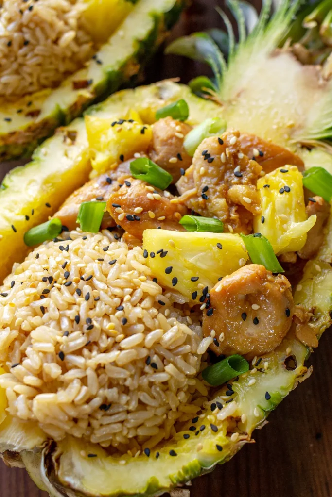 Chicken Teriyaki Pineapple Bowls with Brown Rice served in pineapple boats
