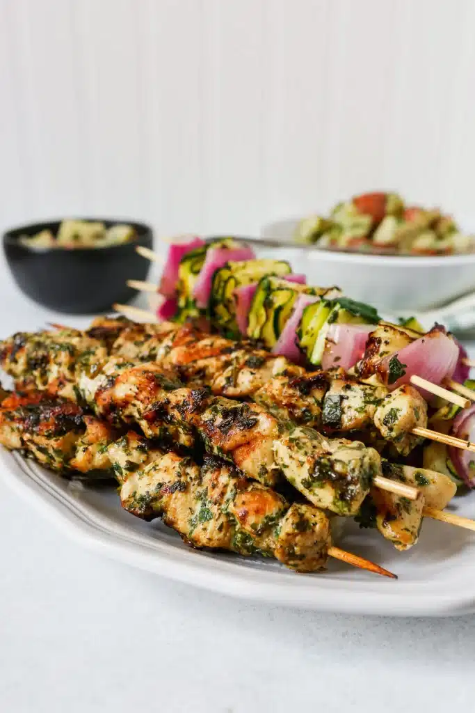 Grilled Chicken & Zucchini Skewers on a platter - one of the recipes for this week's healthy weekly meal plan