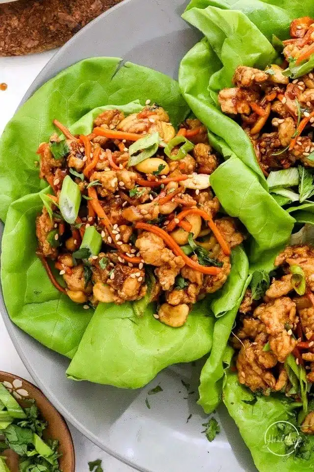 overhead shot of Thai Chicken Lettuce Wraps on a plate - one of the recipes from this week's healthy weekly meal plan