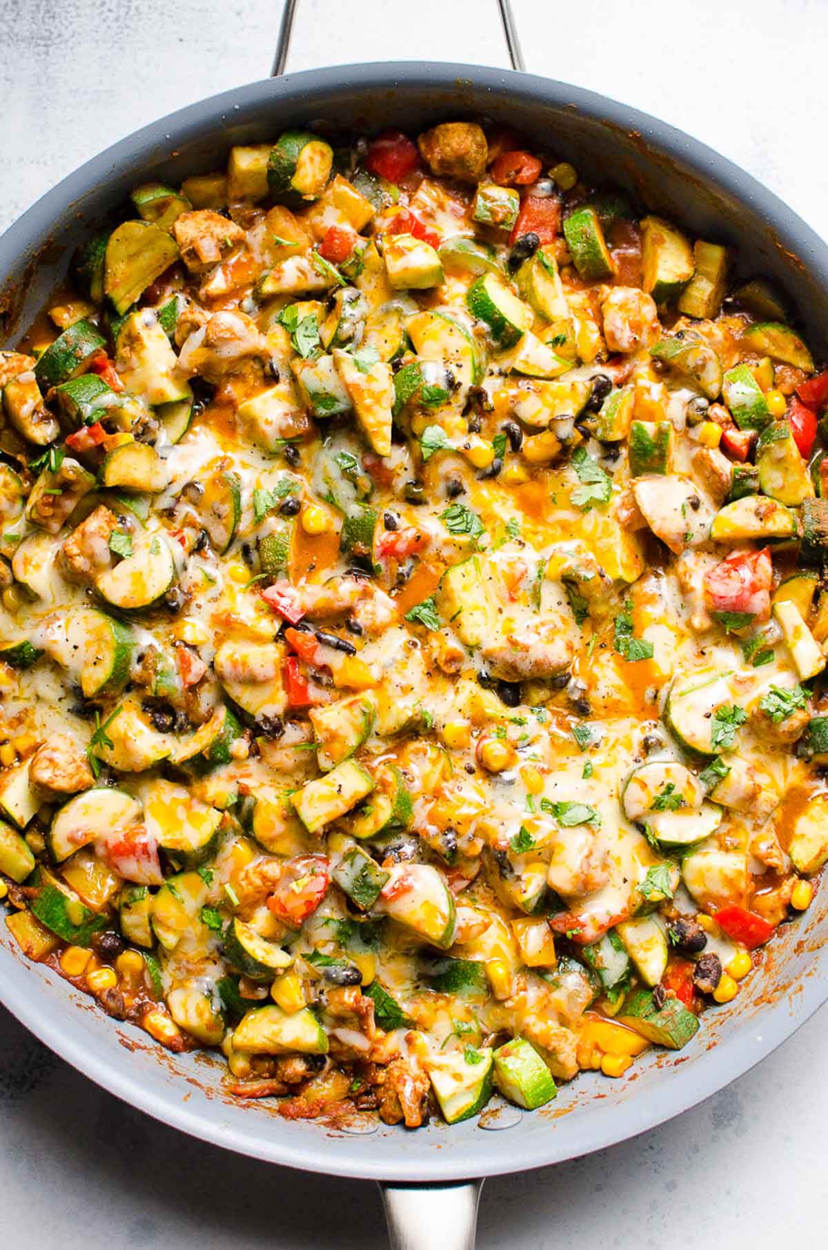 Tex Mex Chicken and Zucchini prepared in a skillet and ready to serve