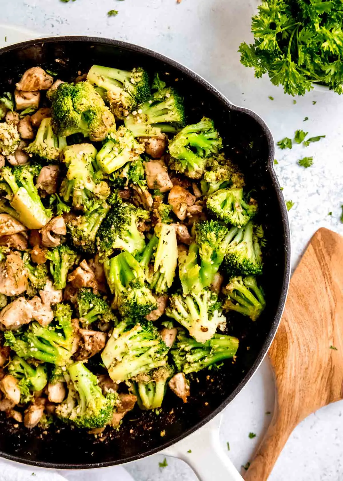 Chicken and Broccoli Skillet cooked in a black cast iron skillet - one of the recipes for this week's healthy weekly meal plan
