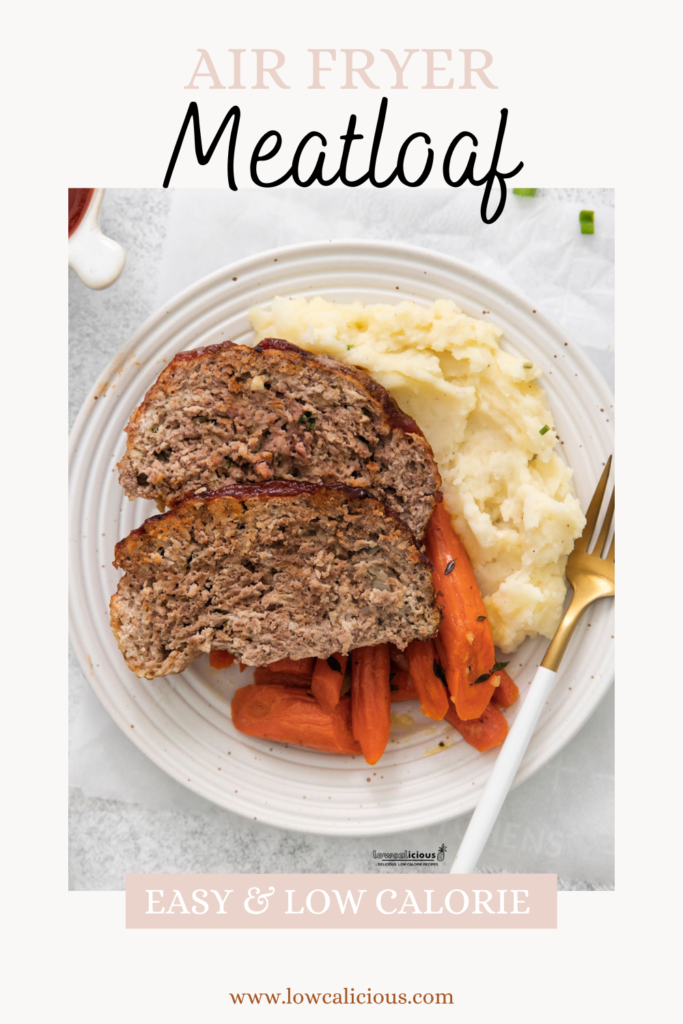 image of cooked Air Fryer Meatloaf on a round white plate with mashed potatoes and roasted carrots. Text is added for Pinterest.